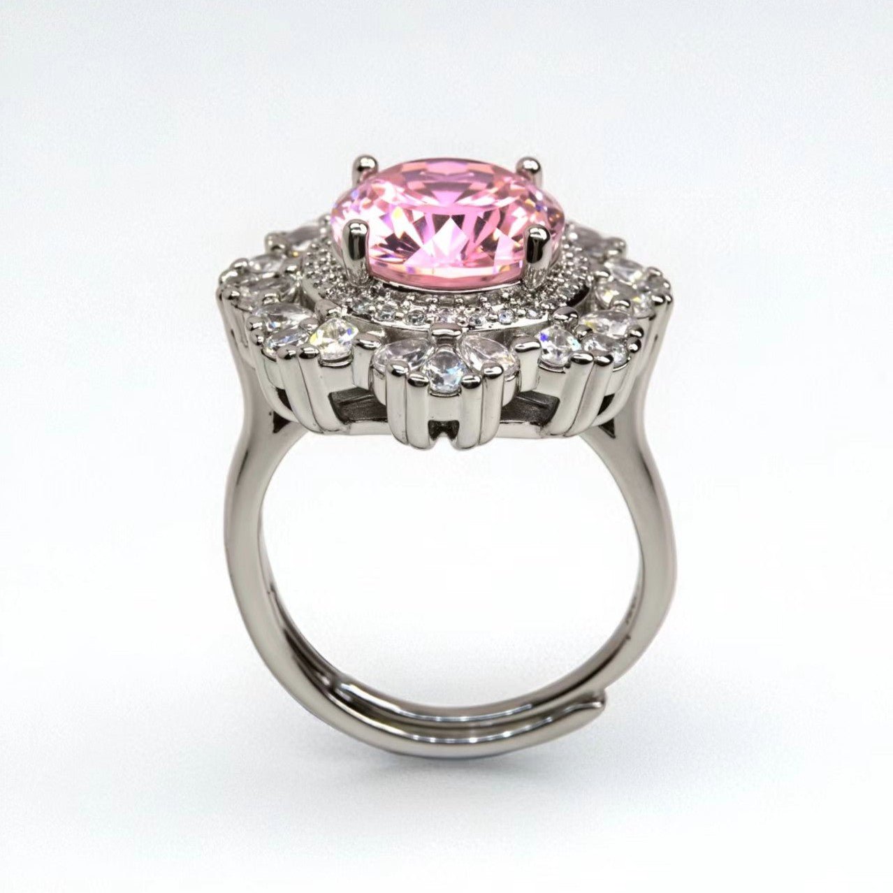 Petal halo cluster ring, oval - cut pink zircon, paved - Sparkslette