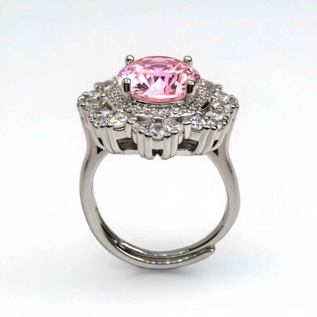 Petal halo cluster ring, oval - cut pink zircon, paved - Sparkslette