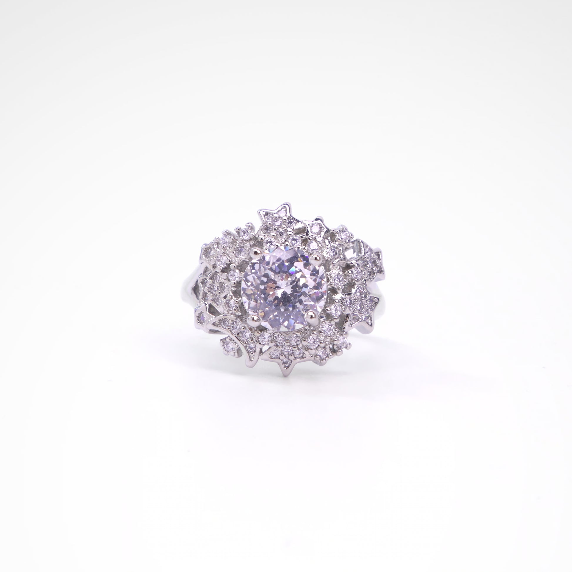 Celestial Starlight Round Halo Cocktail Ring, white-gold plated copper with zircon stones with a white background