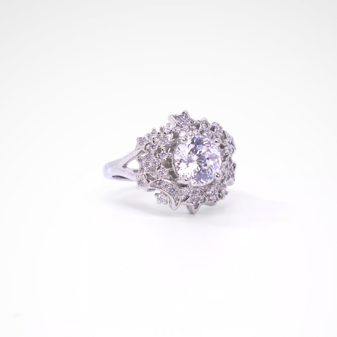 Celestial Starlight Round Halo Cocktail Ring, white-gold plated copper with zircon stones with a white background