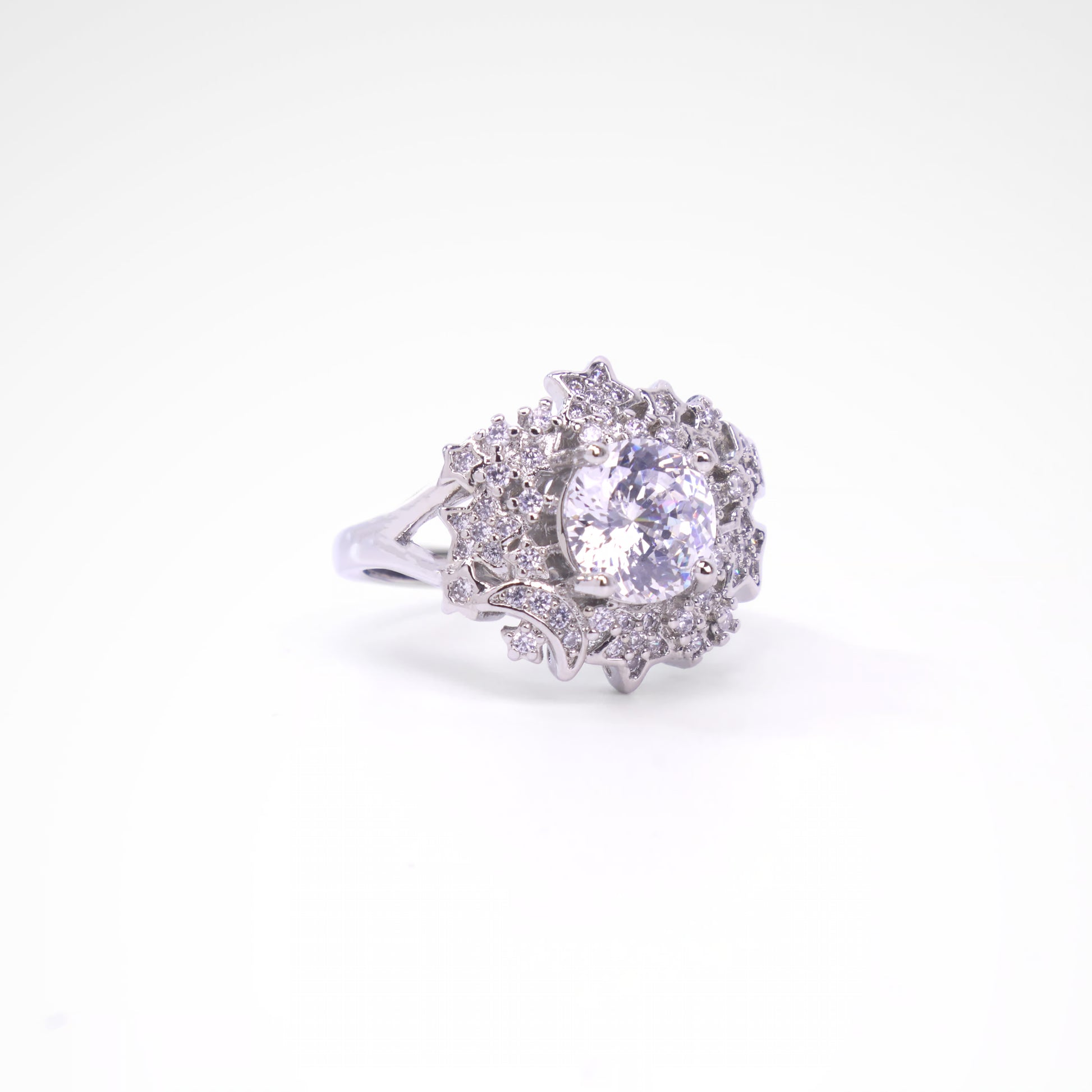 Celestial Starlight Round Halo Cocktail Ring, white-gold plated copper with zircon stones with a white background