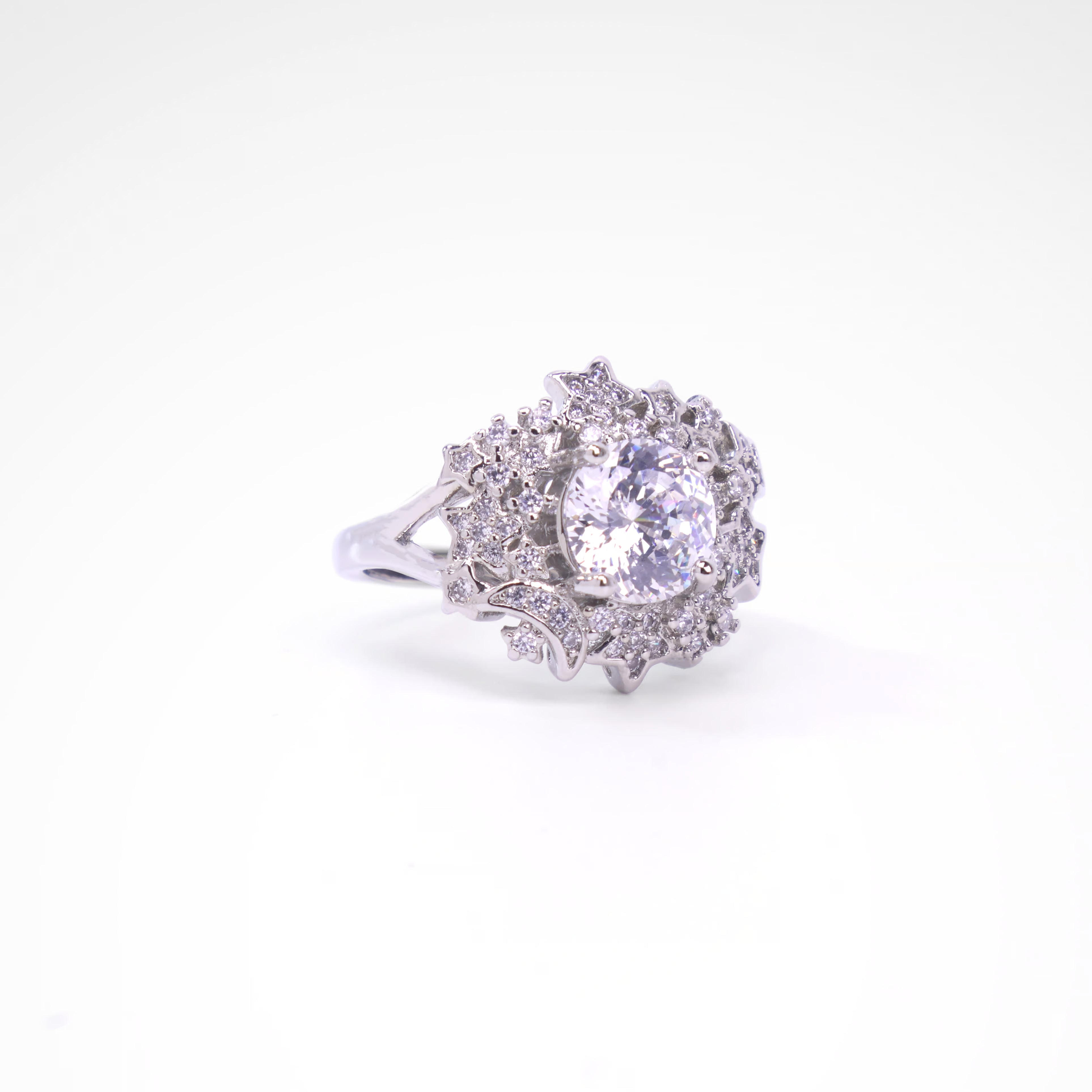 Celestial Starlight Round Halo Cocktail Ring, white-gold plated copper with zircon stones with a white background