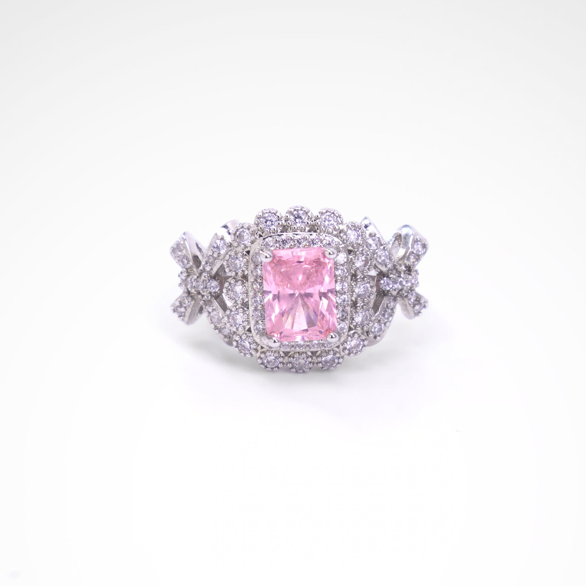 Enchanted Blush Radiant Bow Cocktail Ring, white-gold plated copper with zircon stones with a white background