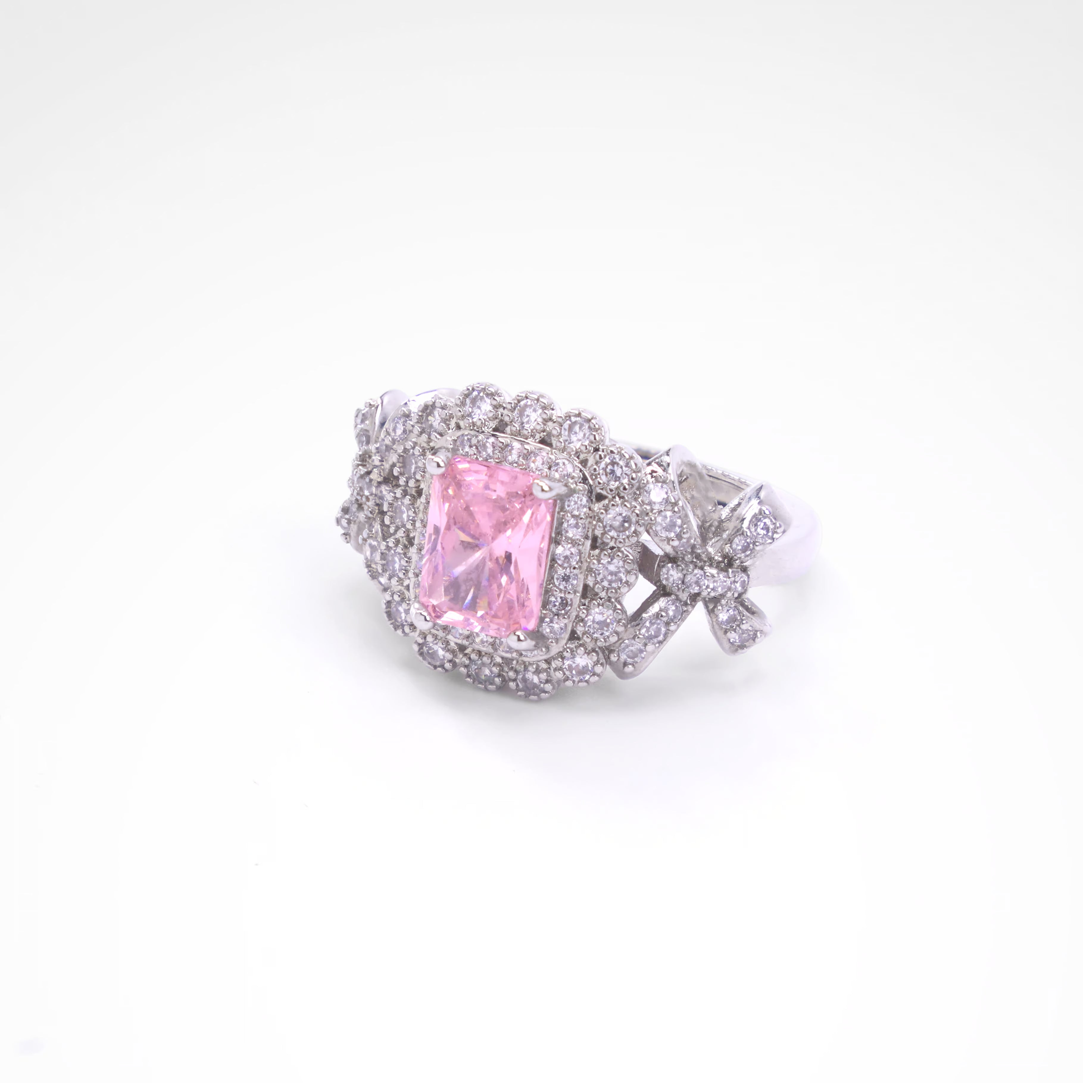 Enchanted Blush Radiant Bow Cocktail Ring, white-gold plated copper with zircon stones with a white background