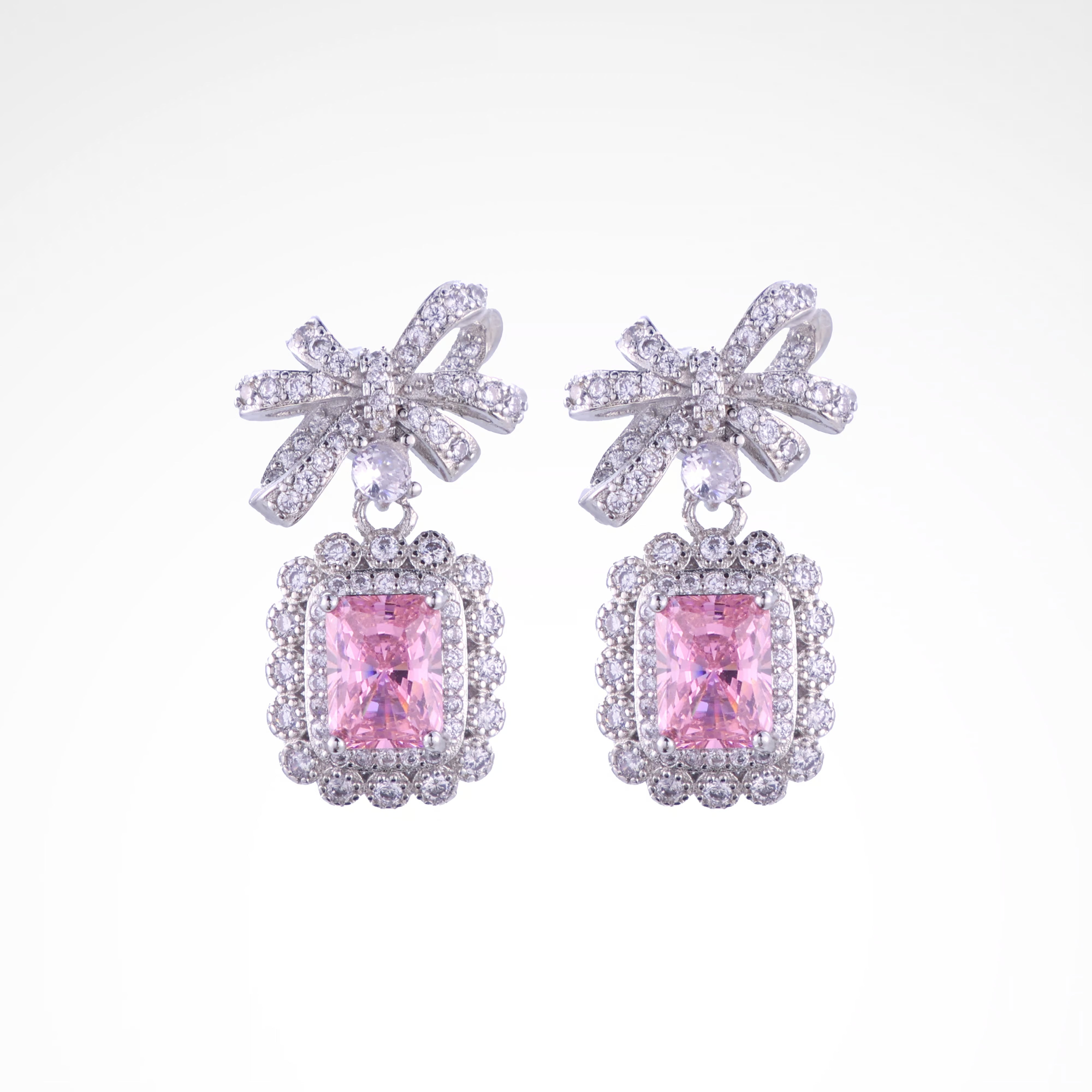 Enchanted Blush Radiant Bow Drop Earrings, white-gold plated copper with zircon stones with a white background
