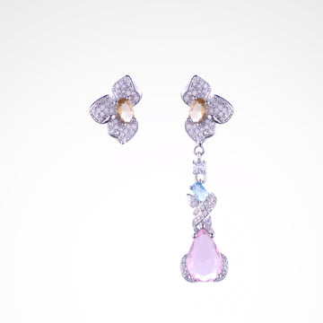 Enchanted Garden Pastel Asymmetrical Drop Earrings, white-gold plated copper with zircon stones with a white background