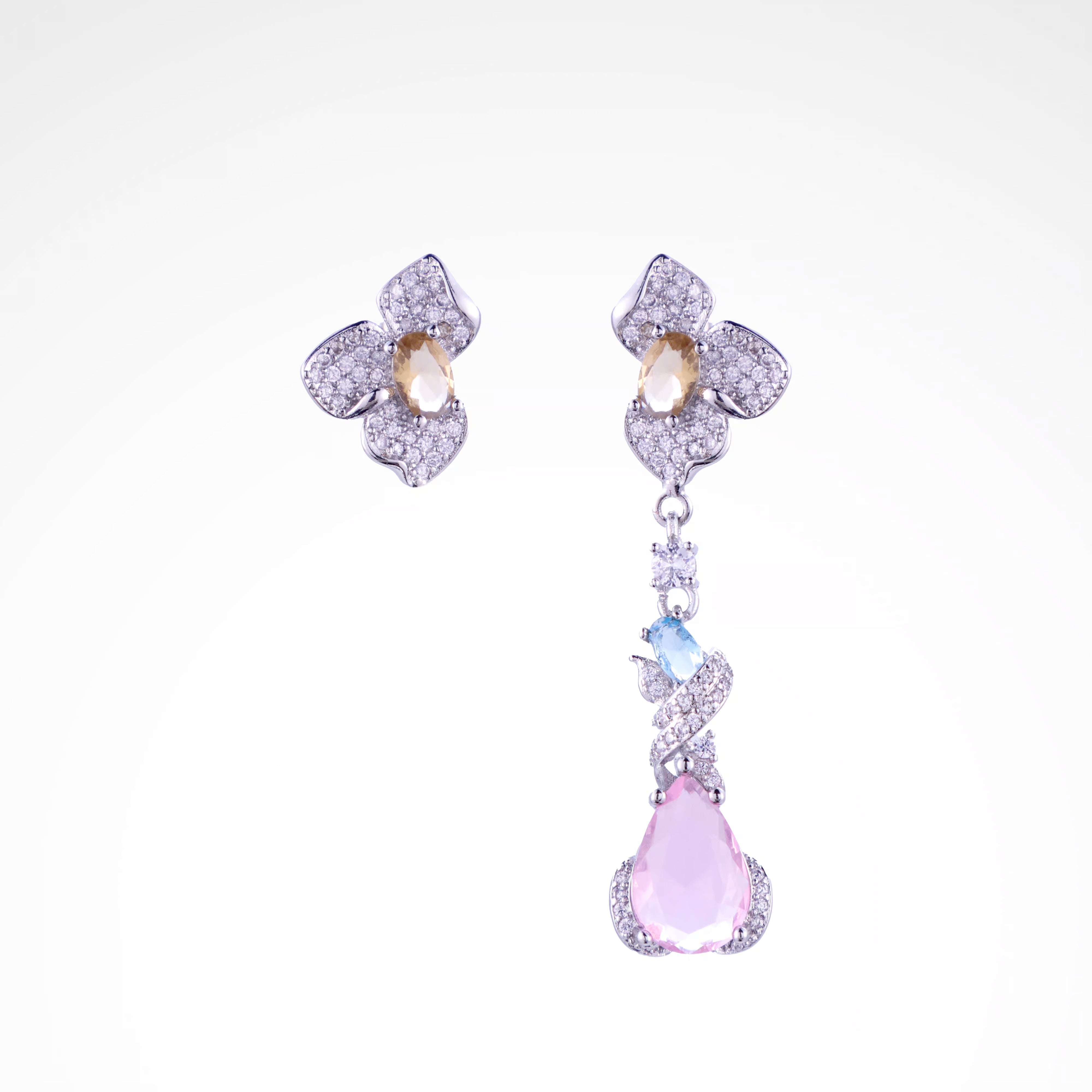 Enchanted Garden Pastel Asymmetrical Drop Earrings, white-gold plated copper with zircon stones with a white background