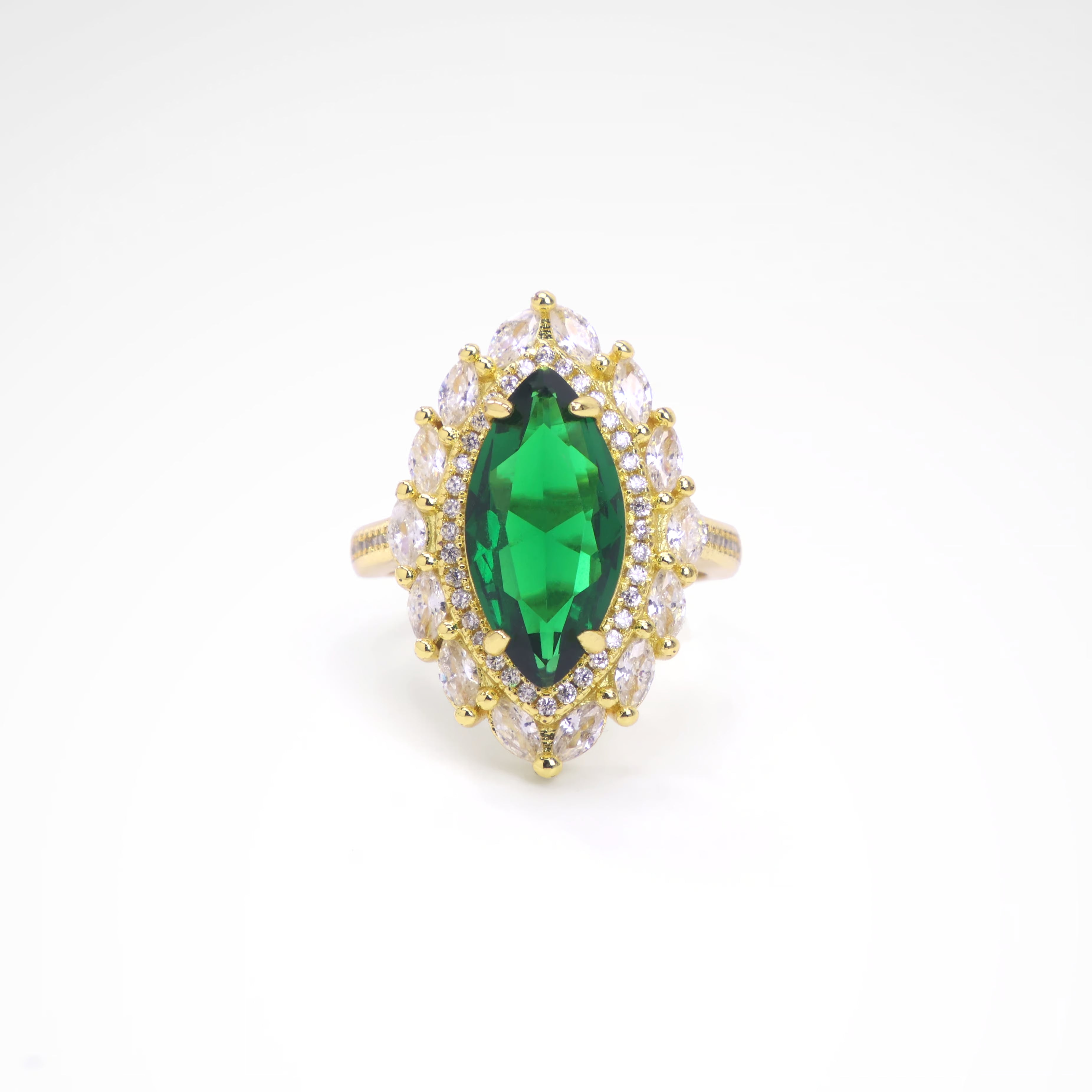 Imperial Emerald Green Marquise Sunburst Ring, white-gold plated copper with zircon stones with a white background
