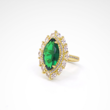Imperial Emerald Green Marquise Sunburst Ring, white-gold plated copper with zircon stones with a white background