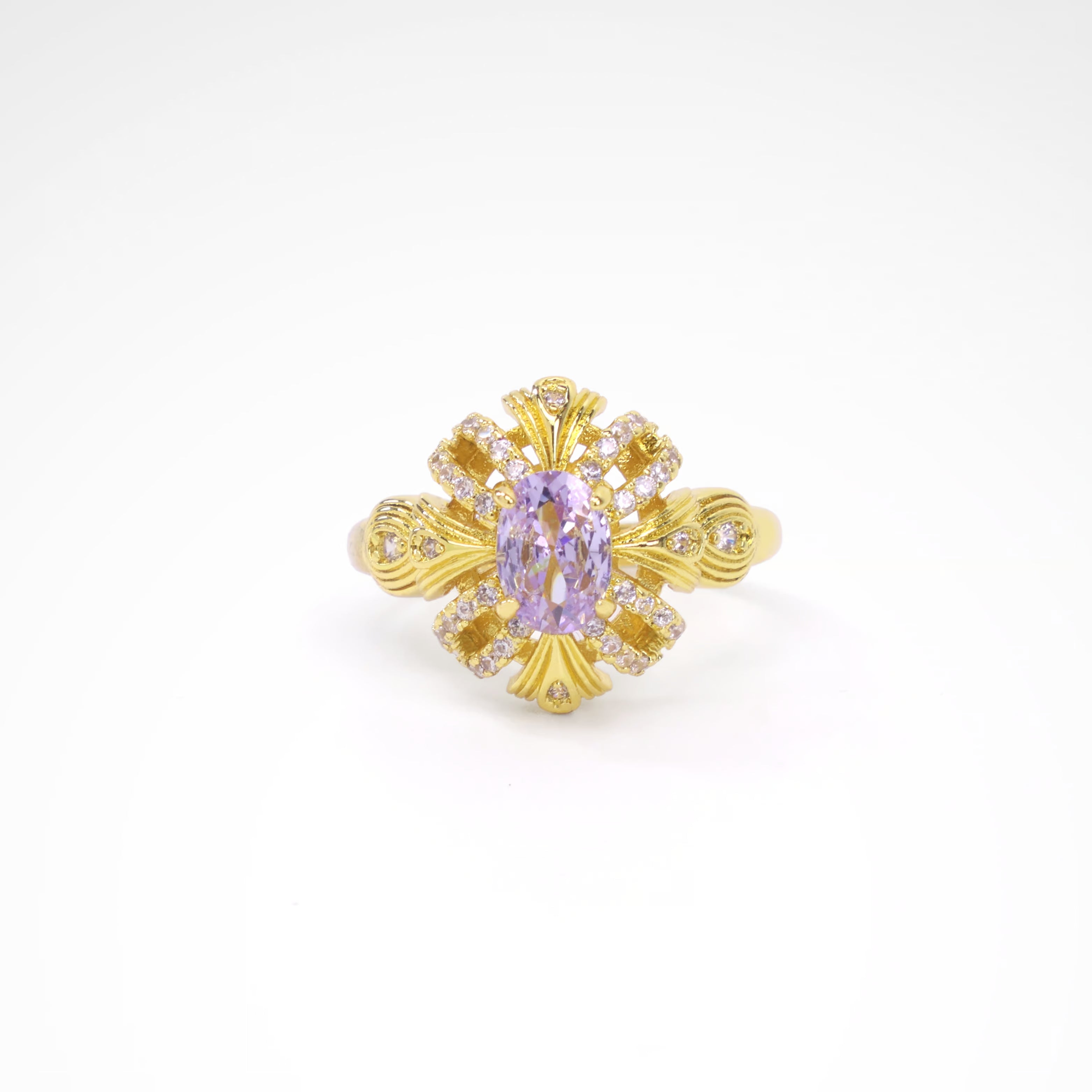 Imperial Lavender Gold-Tone Ribbon Ring, gold plated copper with zircon stones with a white background