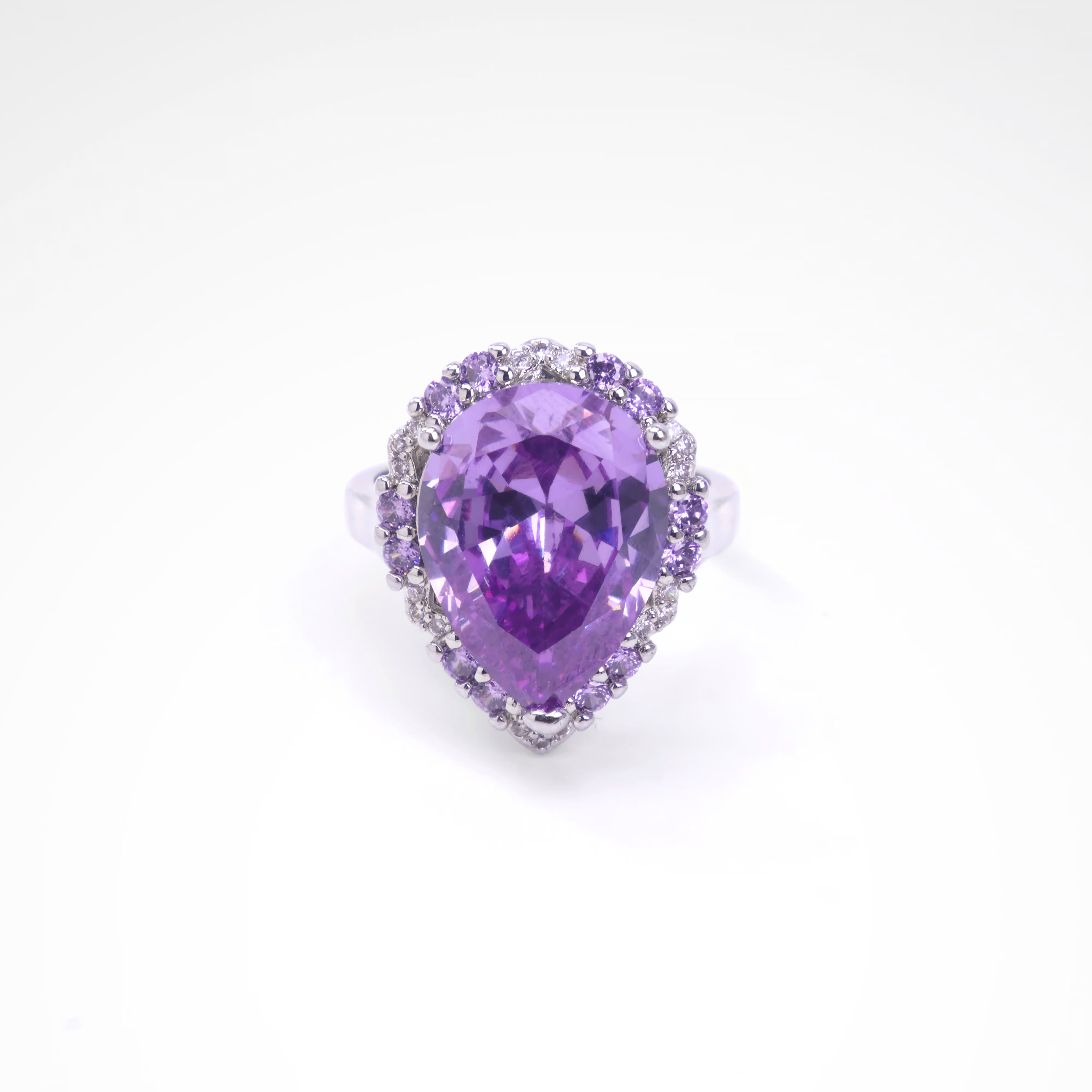 Majestic Violet Pear-Cut Halo Cocktail Ring, white-gold plated copper with zircon stones with a white background