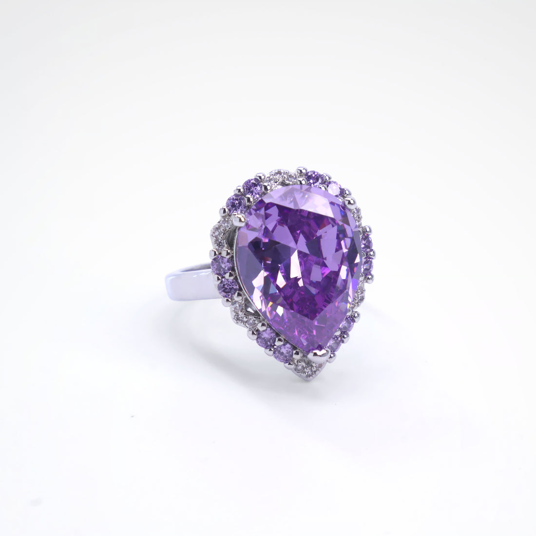 Majestic Violet Pear-Cut Halo Cocktail Ring, white-gold plated copper with zircon stones with a white background