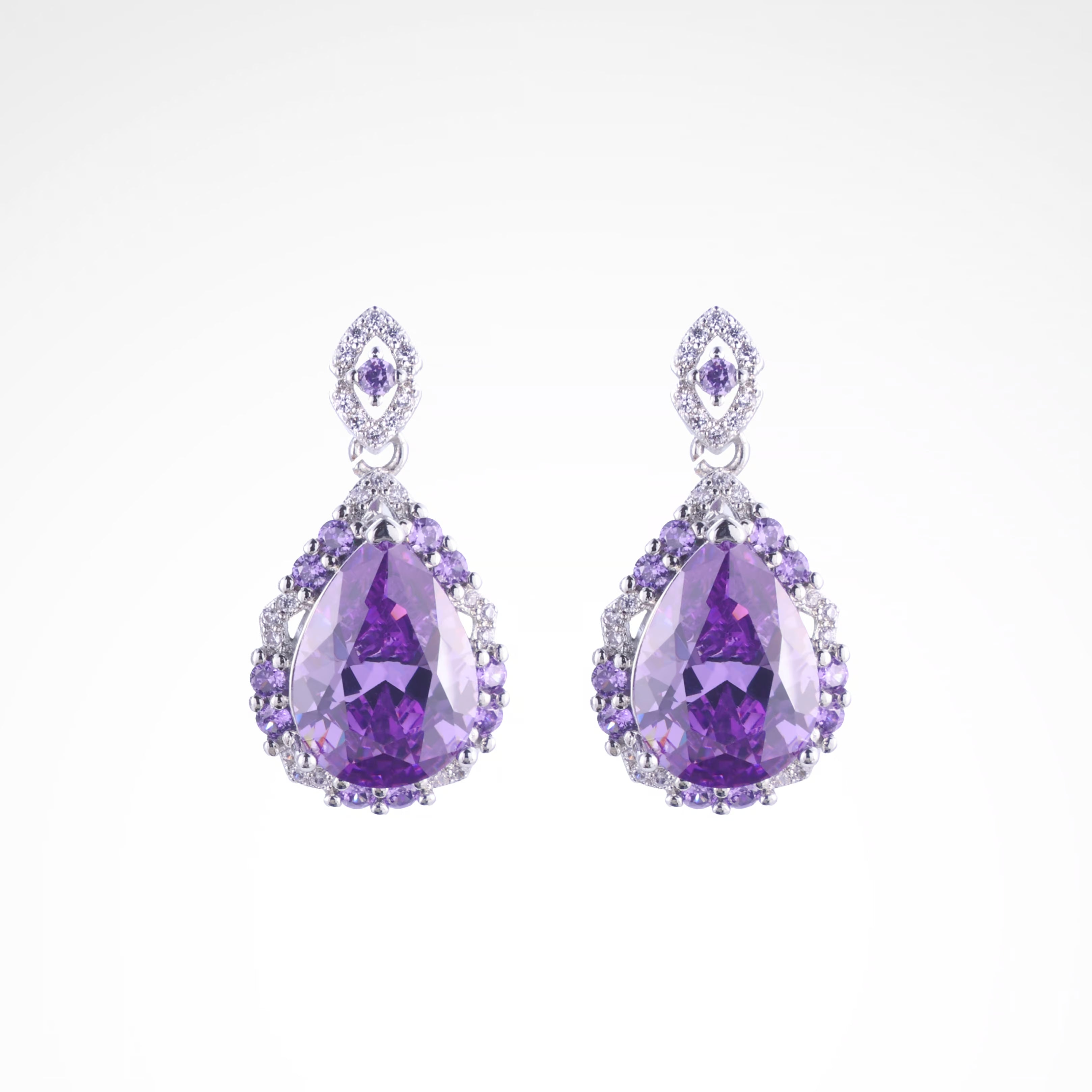 Majestic Violet Pear-Cut Halo Drop Earrings, white-gold plated copper with zircon stones with a white background
