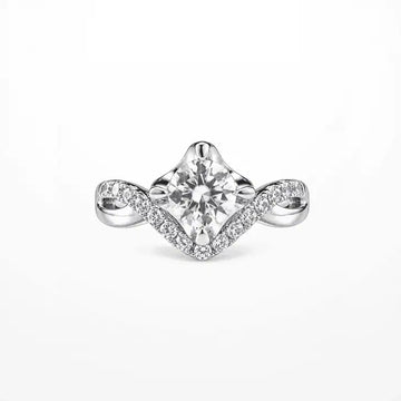 Radiant Embrace Round Moissanite Twist Ring