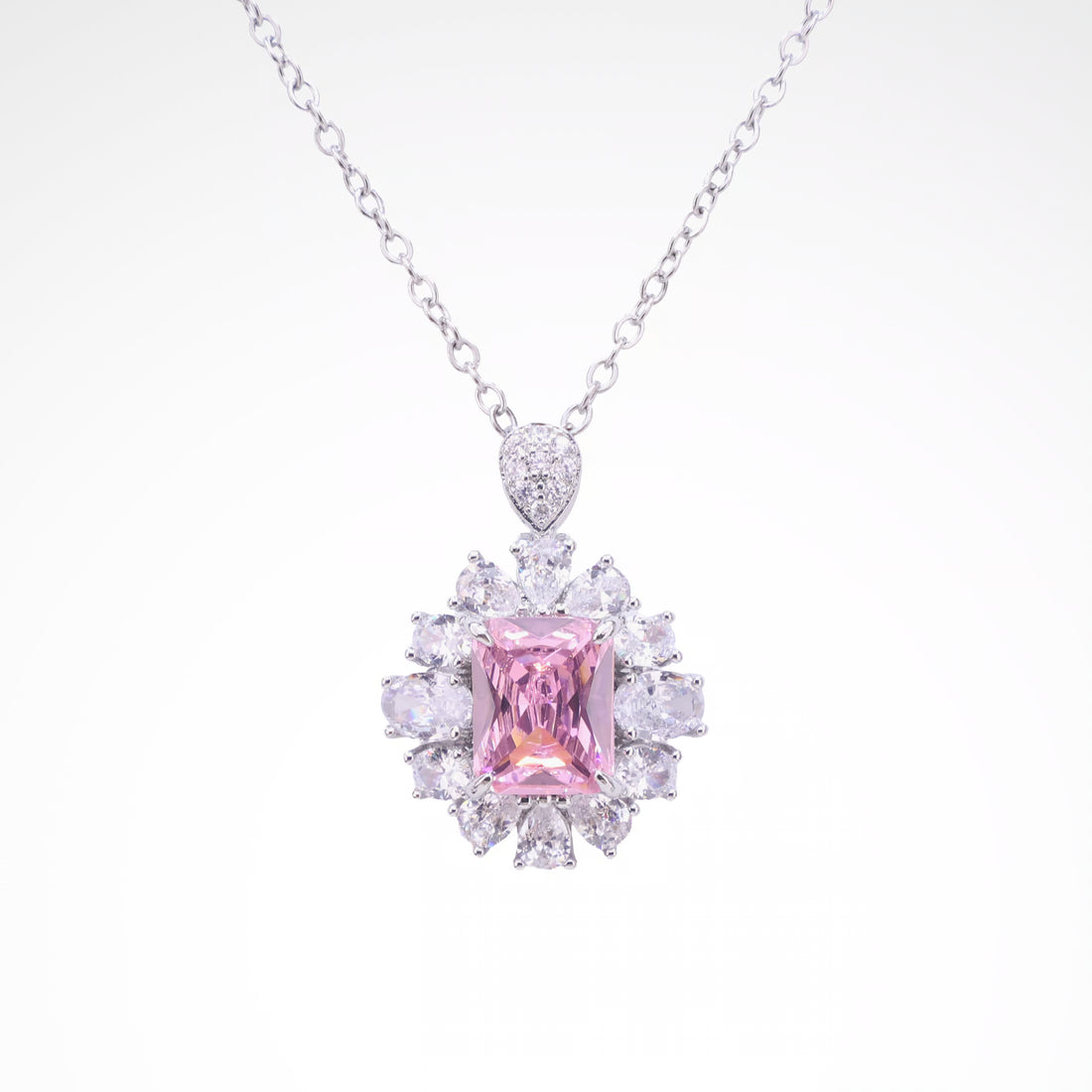Radiant Blush Cushion-Cut Floral Halo Pendant Necklace, white-gold plated copper with zircon stones with a white background