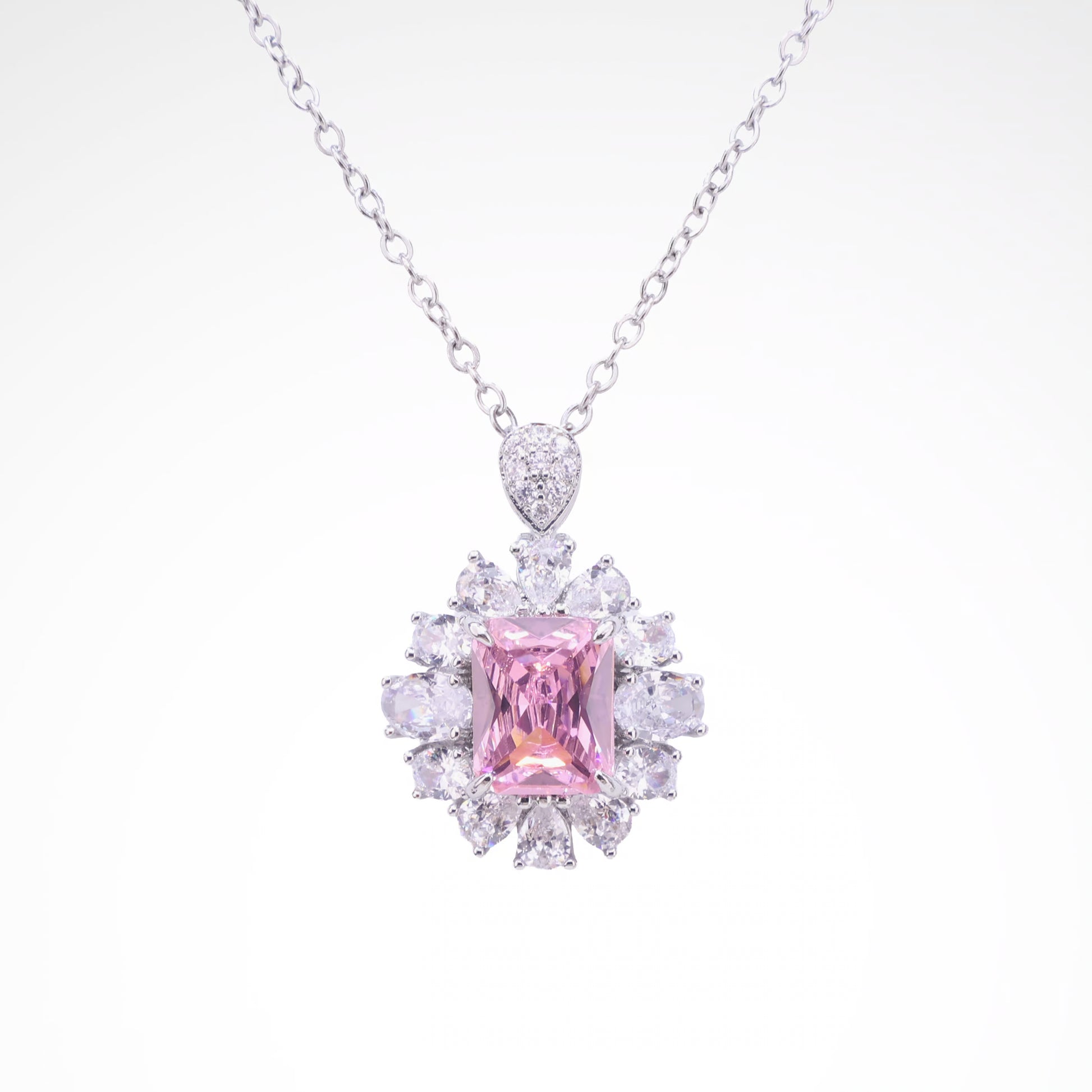 Radiant Blush Cushion-Cut Floral Halo Pendant Necklace, white-gold plated copper with zircon stones with a white background
