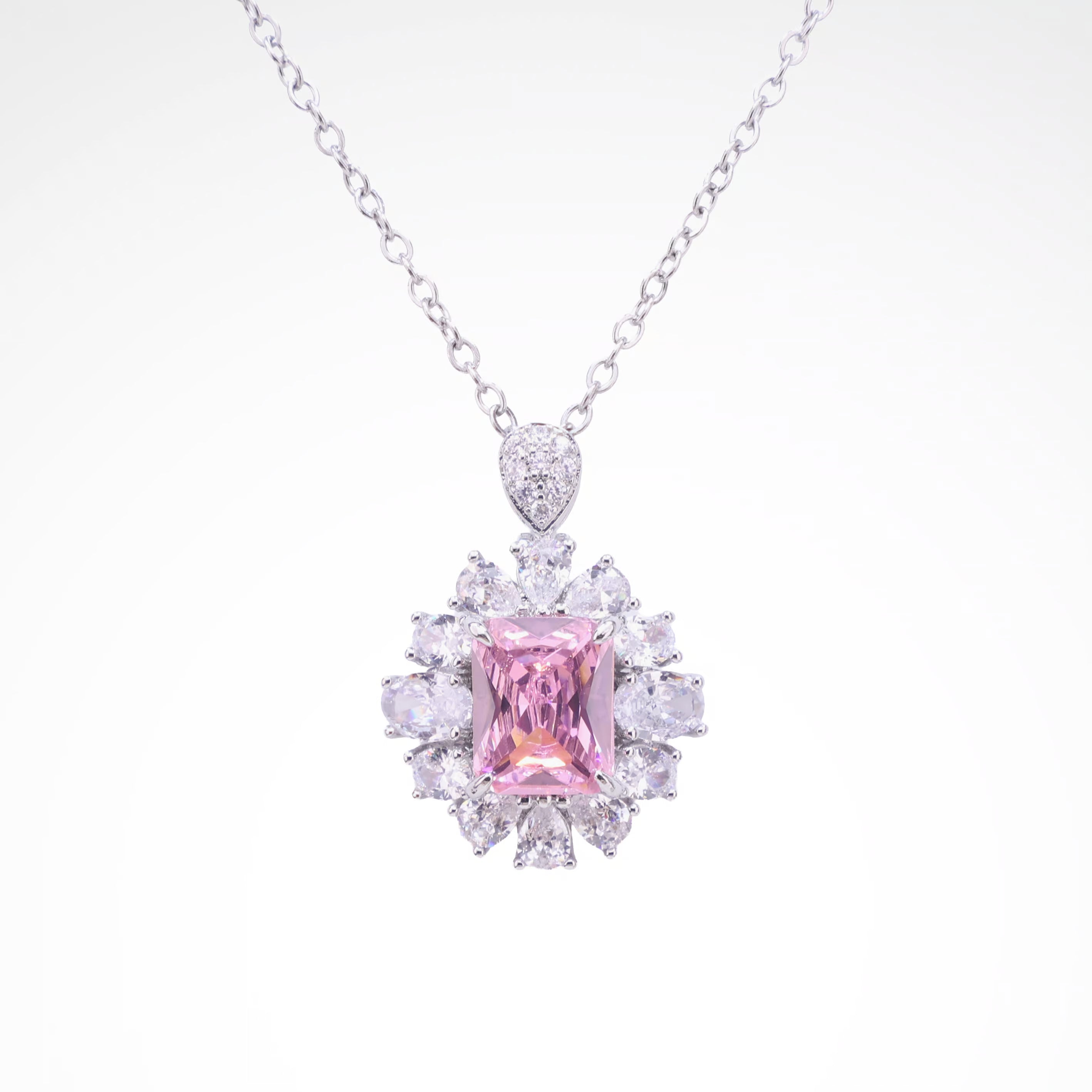 Radiant Blush Cushion-Cut Floral Halo Pendant Necklace, white-gold plated copper with zircon stones with a white background