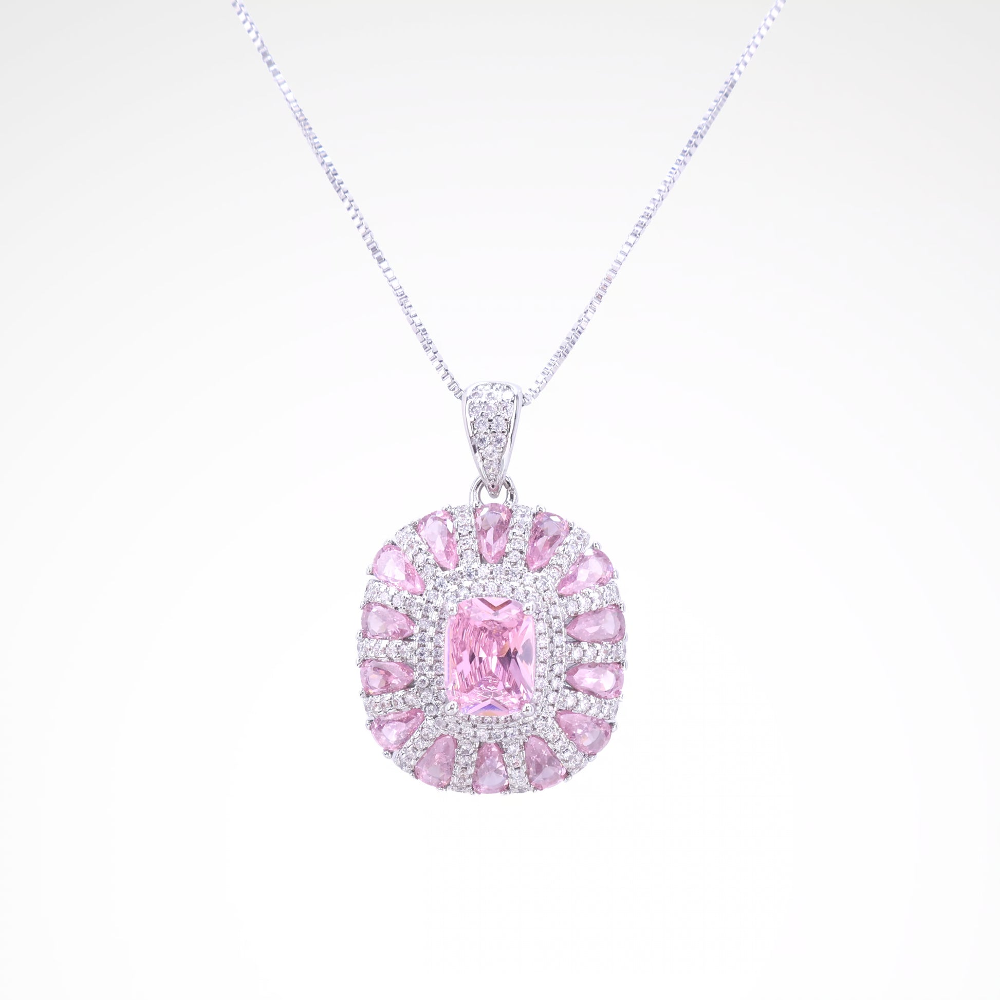Radiant Blush Mosaic Sunburst Pendant Necklace, white-gold plated copper with zircon stones with a white background