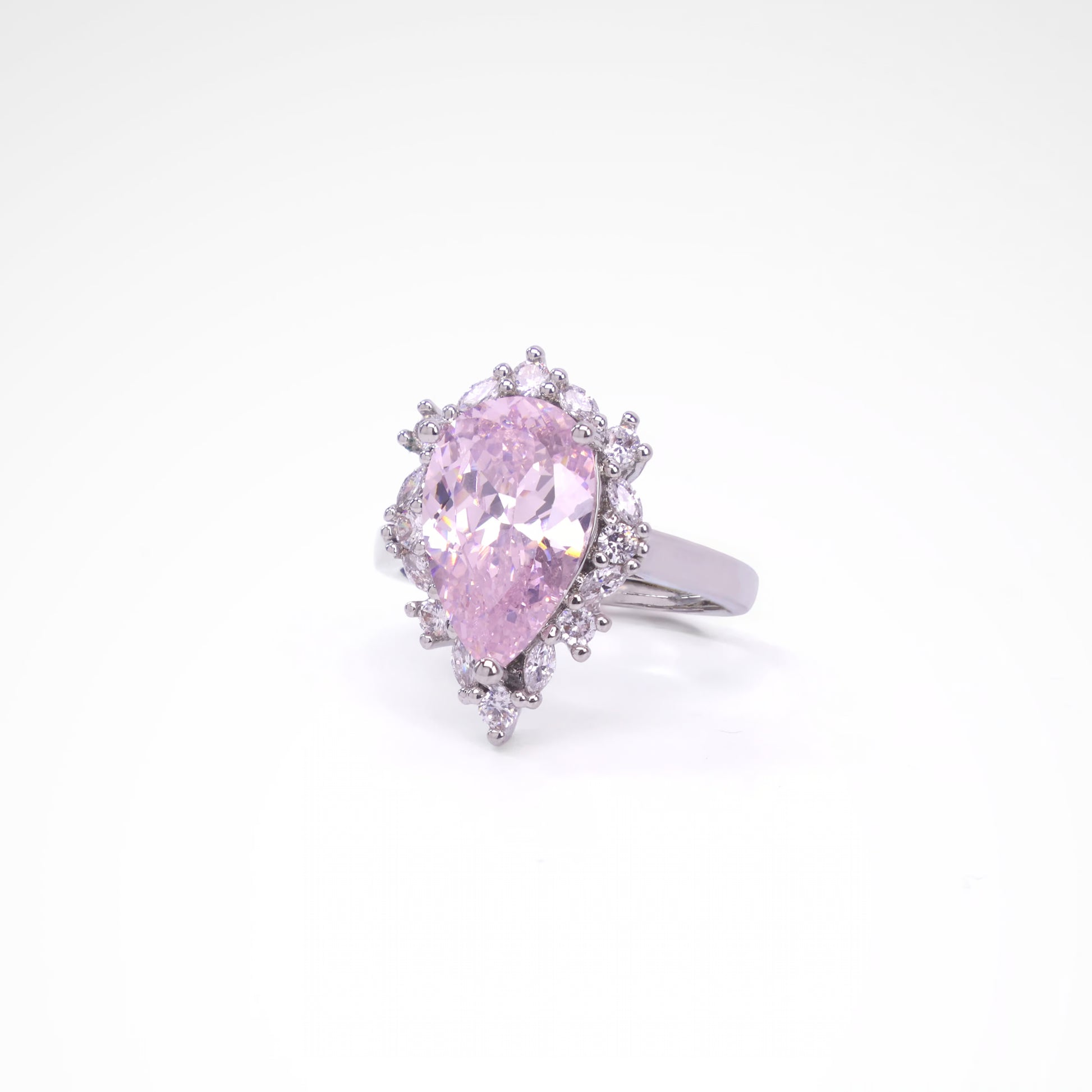 Radiant Blush Pear-Cut Halo Cocktail Ring, white-gold plated copper with zircon stones with a white background