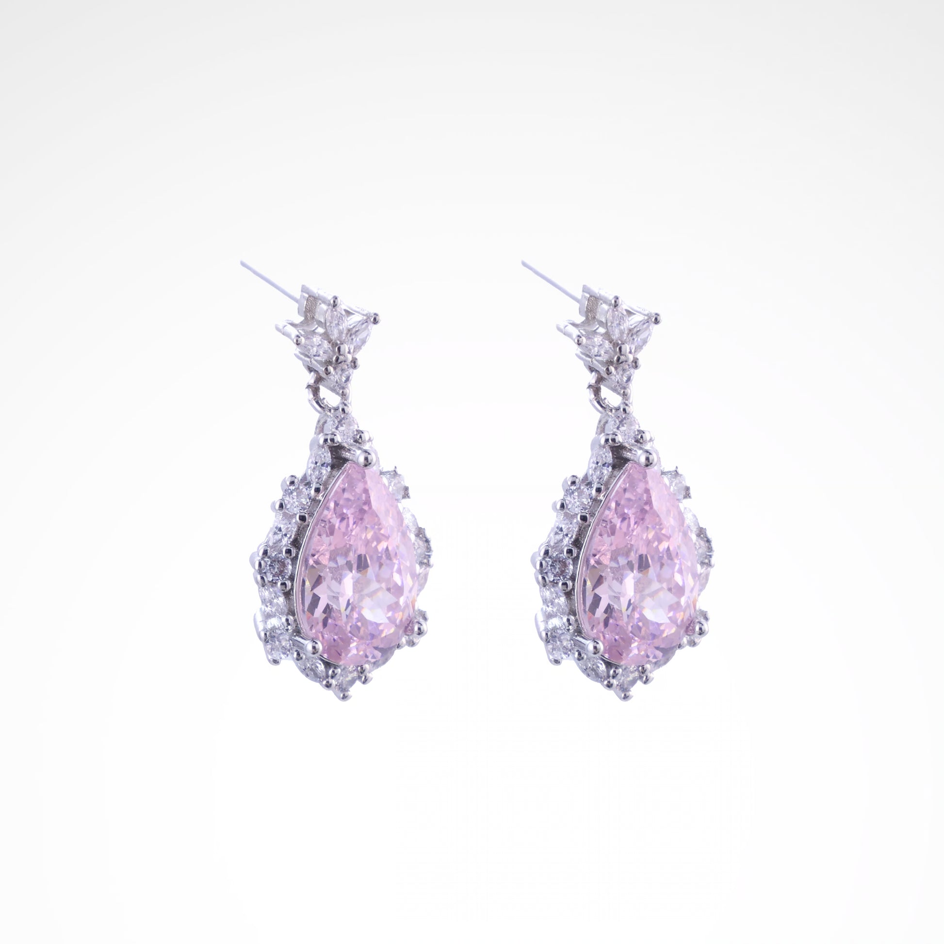 Radiant Blush Pear-Cut Halo Drop Earrings, white-gold plated copper with zircon stones with a white background