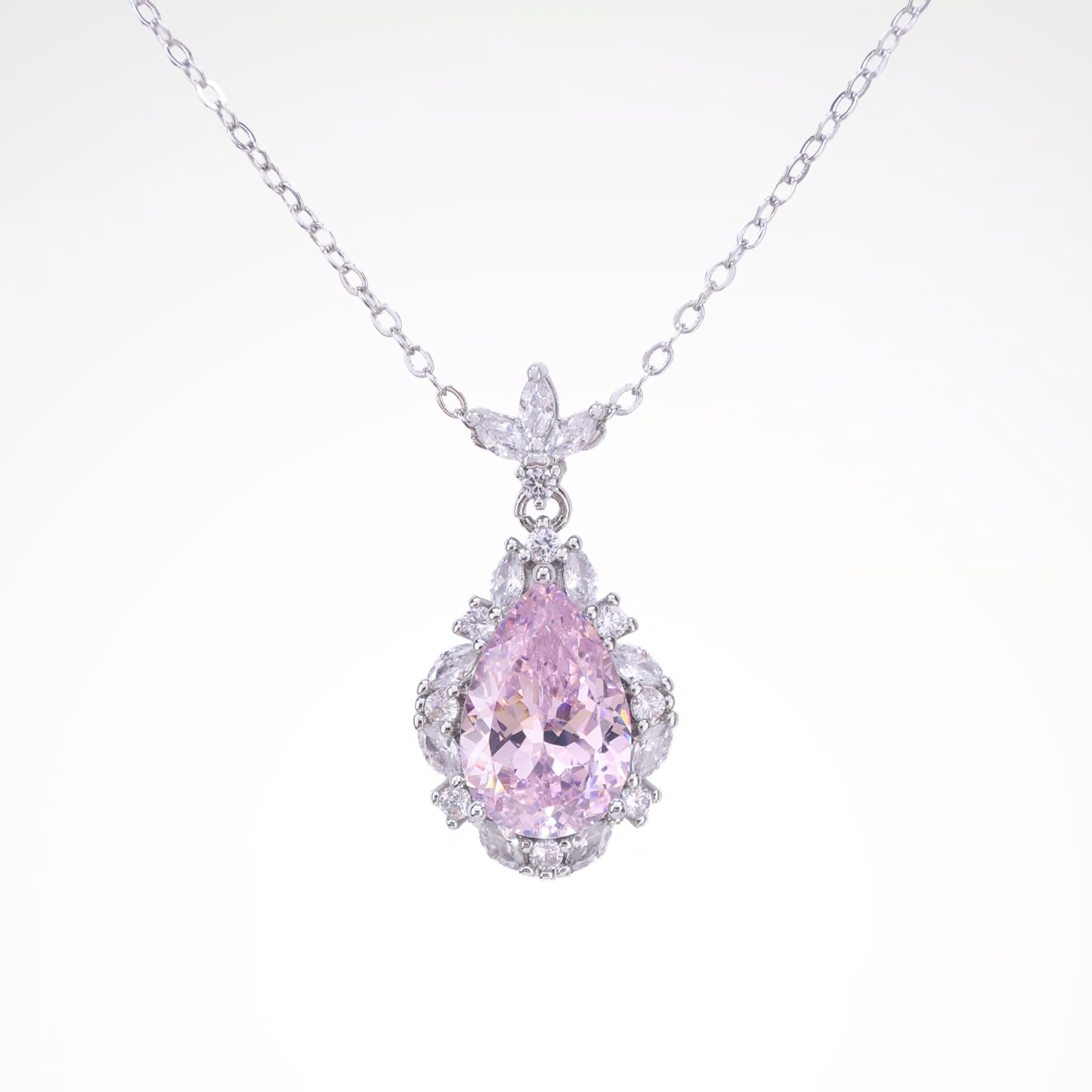 Radiant Blush Pear-Cut Halo Pendant Necklace, white-gold plated copper with zircon stones with a white background