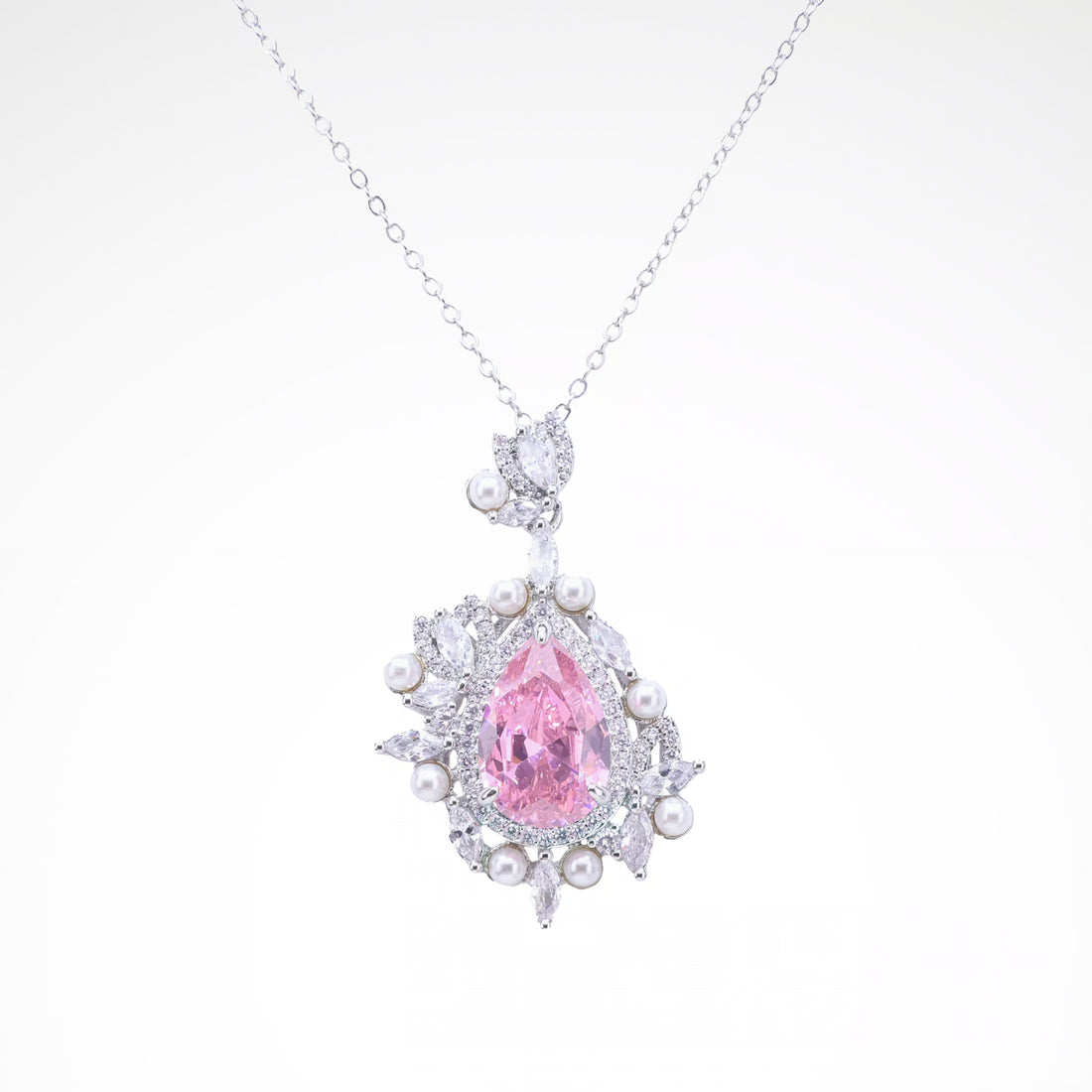 Regal Blush Pearl & Crystal Pear-Cut Pendant, white-gold plated copper with zircon stones with a white background