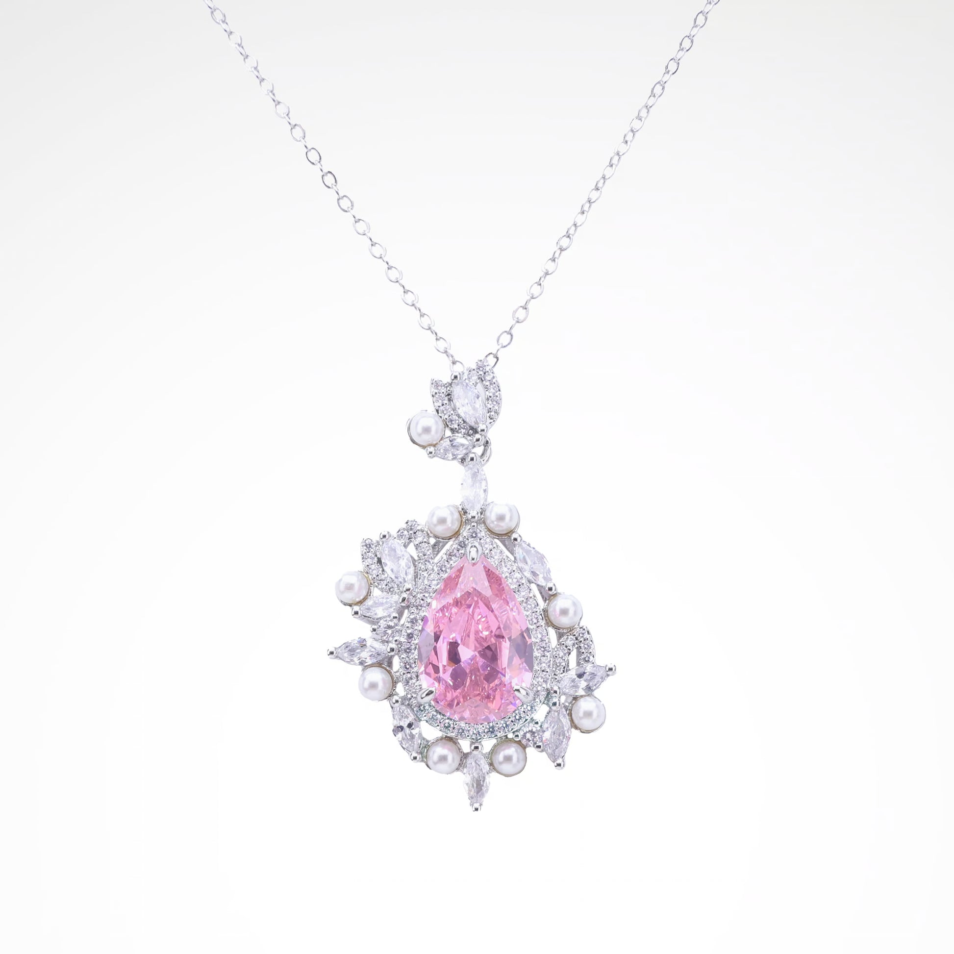 Regal Blush Pearl & Crystal Pear-Cut Pendant, white-gold plated copper with zircon stones with a white background