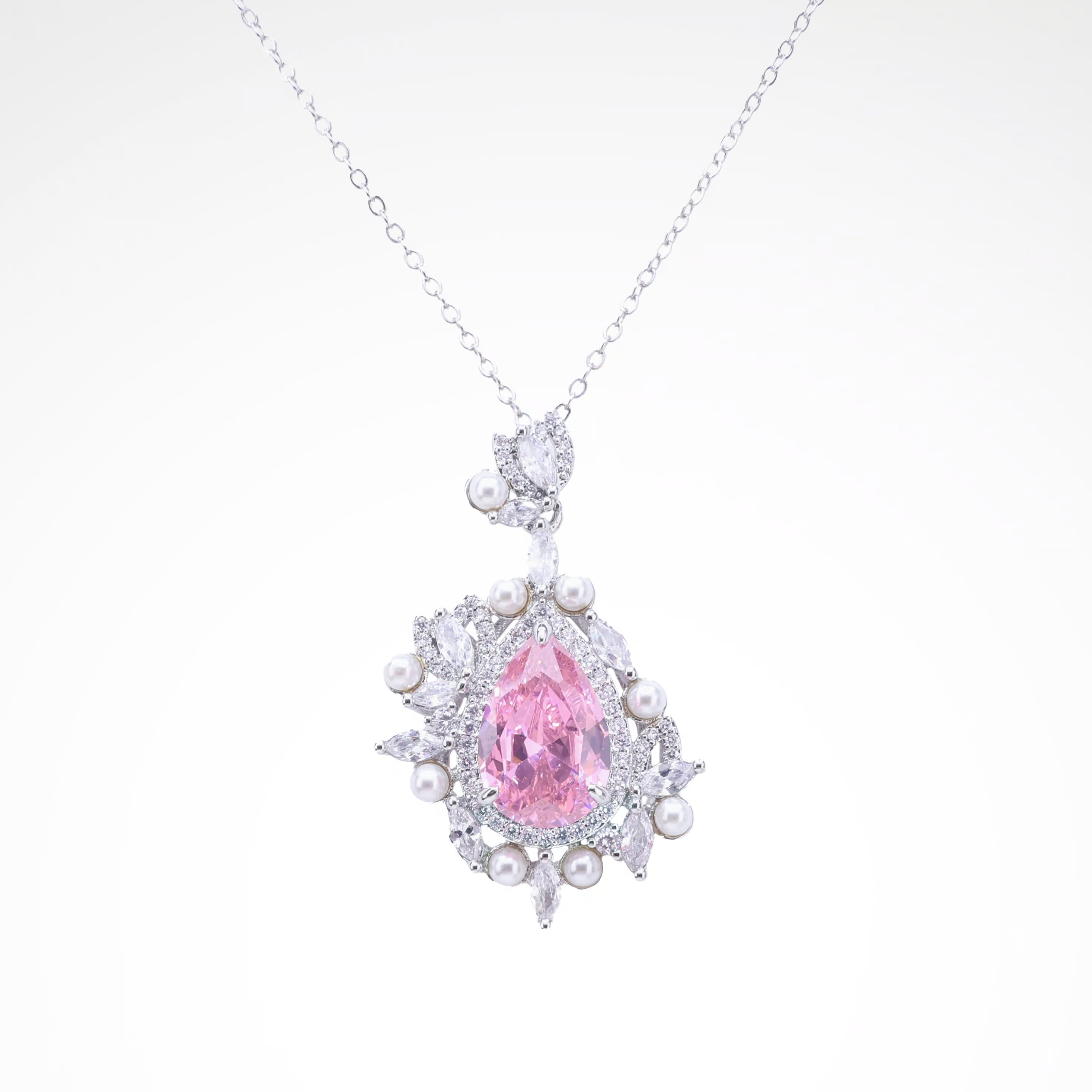 Regal Blush Pearl & Crystal Pear-Cut Pendant, white-gold plated copper with zircon stones with a white background