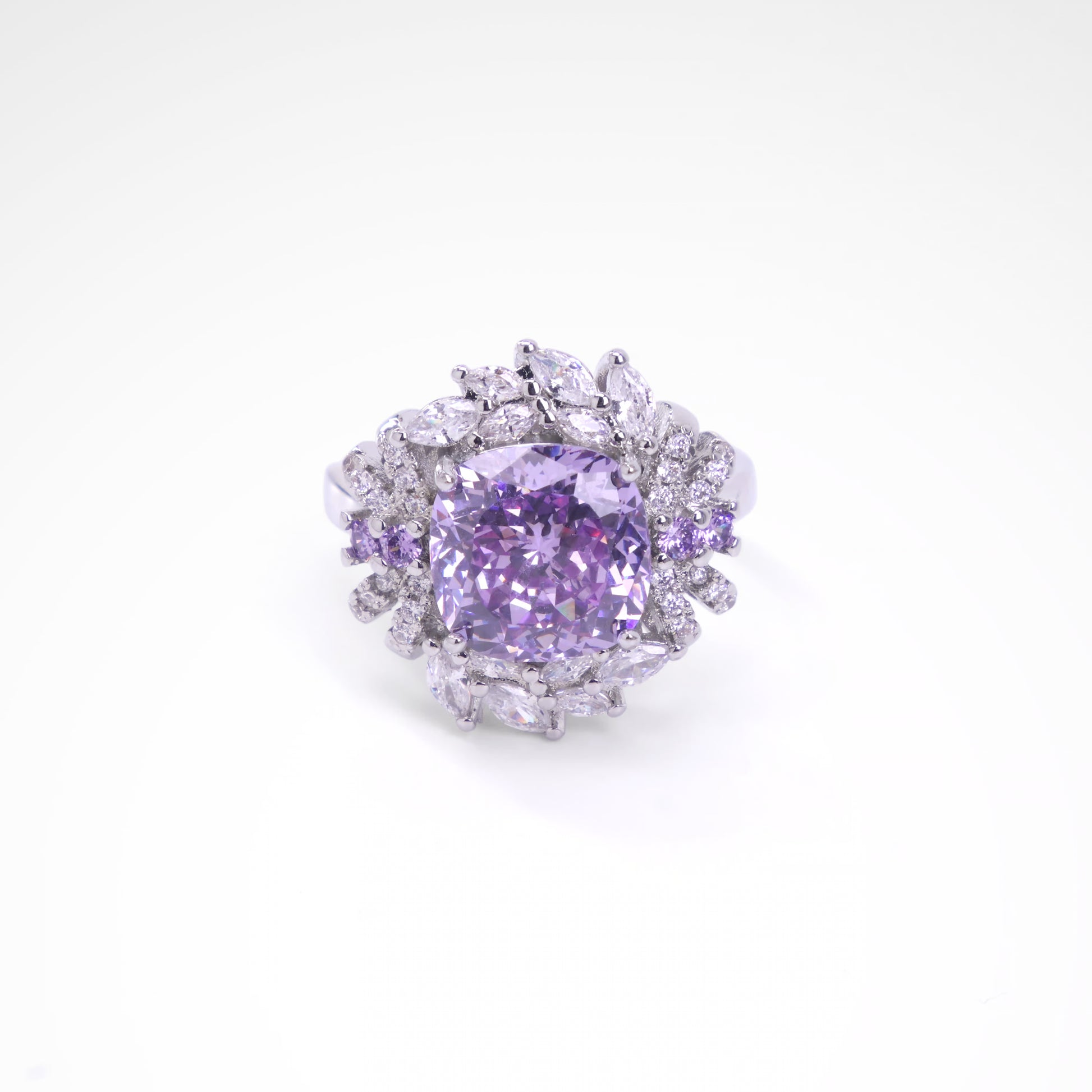 Regal Violet Cushion-Cut Floral Halo Ring, white-gold plated copper with zircon stones on a white background