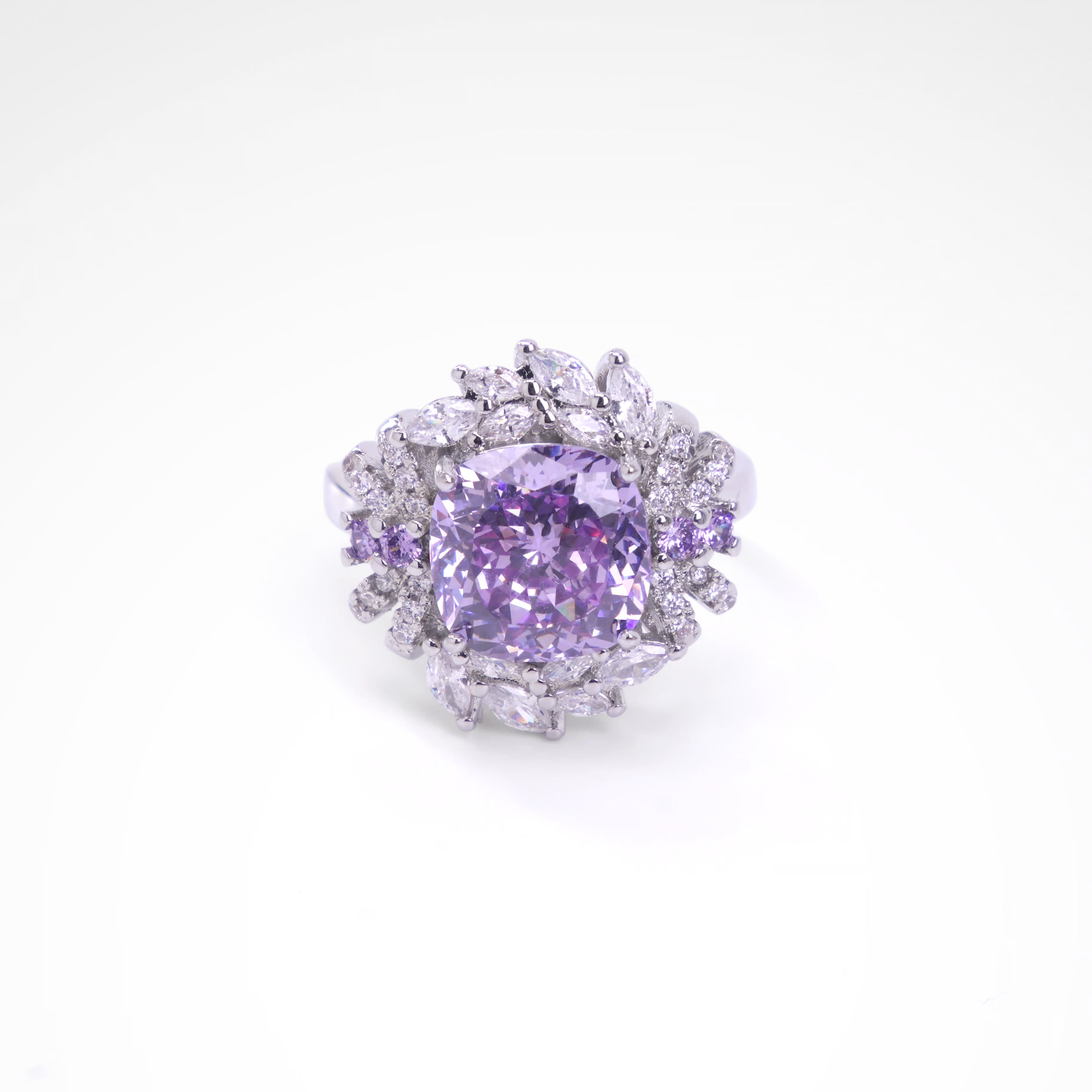 Regal Violet Cushion-Cut Floral Halo Ring, white-gold plated copper with zircon stones on a white background