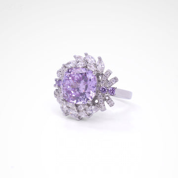 Regal Violet Cushion-Cut Floral Halo Ring, white-gold plated copper with zircon stones on a white background