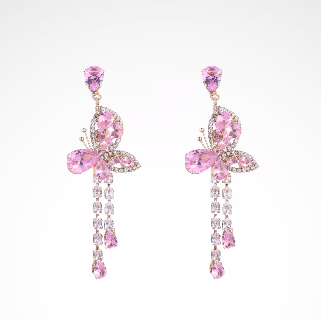 Whimsical Blush Butterfly Crystal Tassel Drop Earrings, white-gold plated copper with zircon stones with a white background