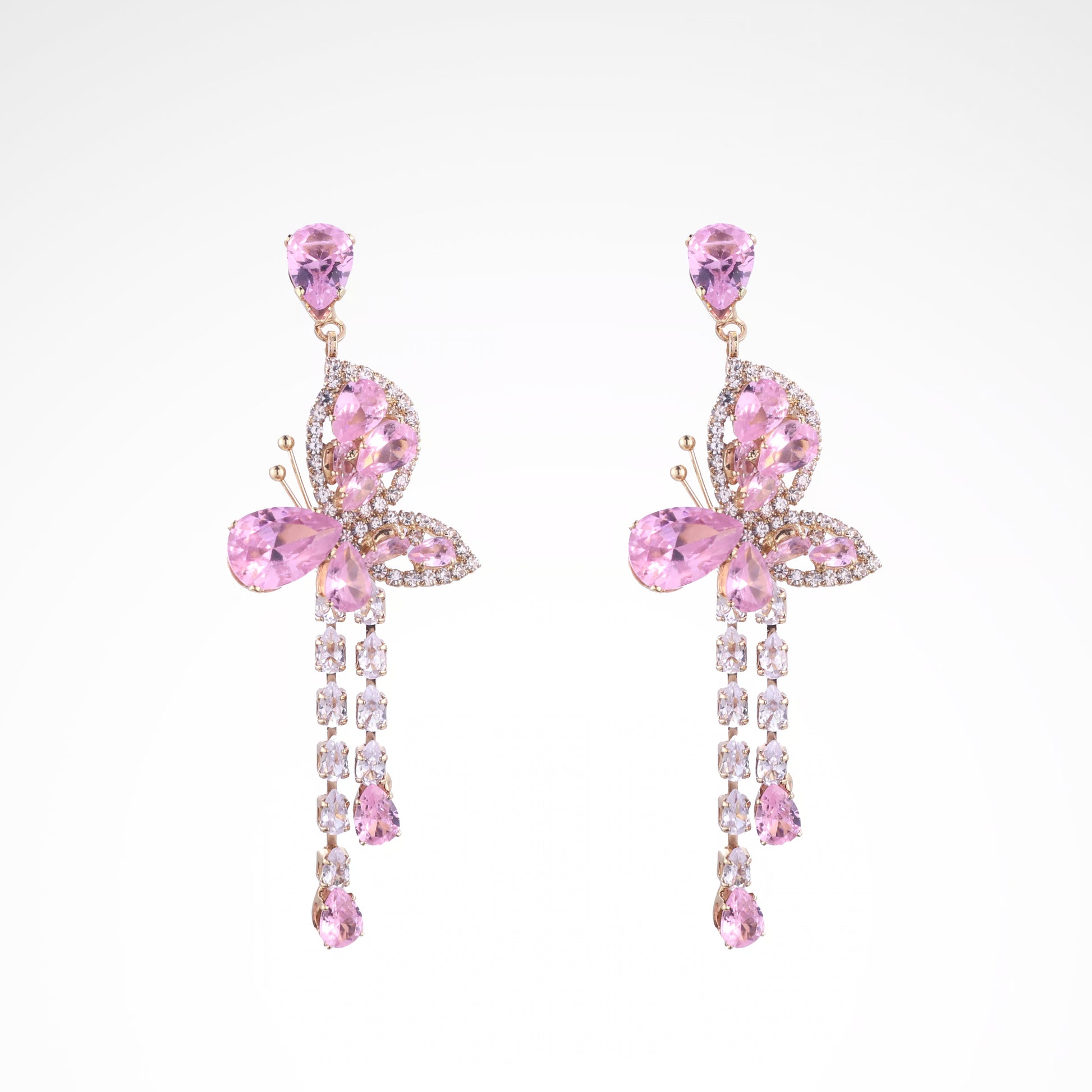 Whimsical Blush Butterfly Crystal Tassel Drop Earrings, white-gold plated copper with zircon stones with a white background